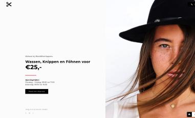 Schermafbeelding van blackandredkappers.nl