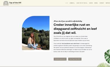 Schermafbeelding van topofthehillretreats.nl